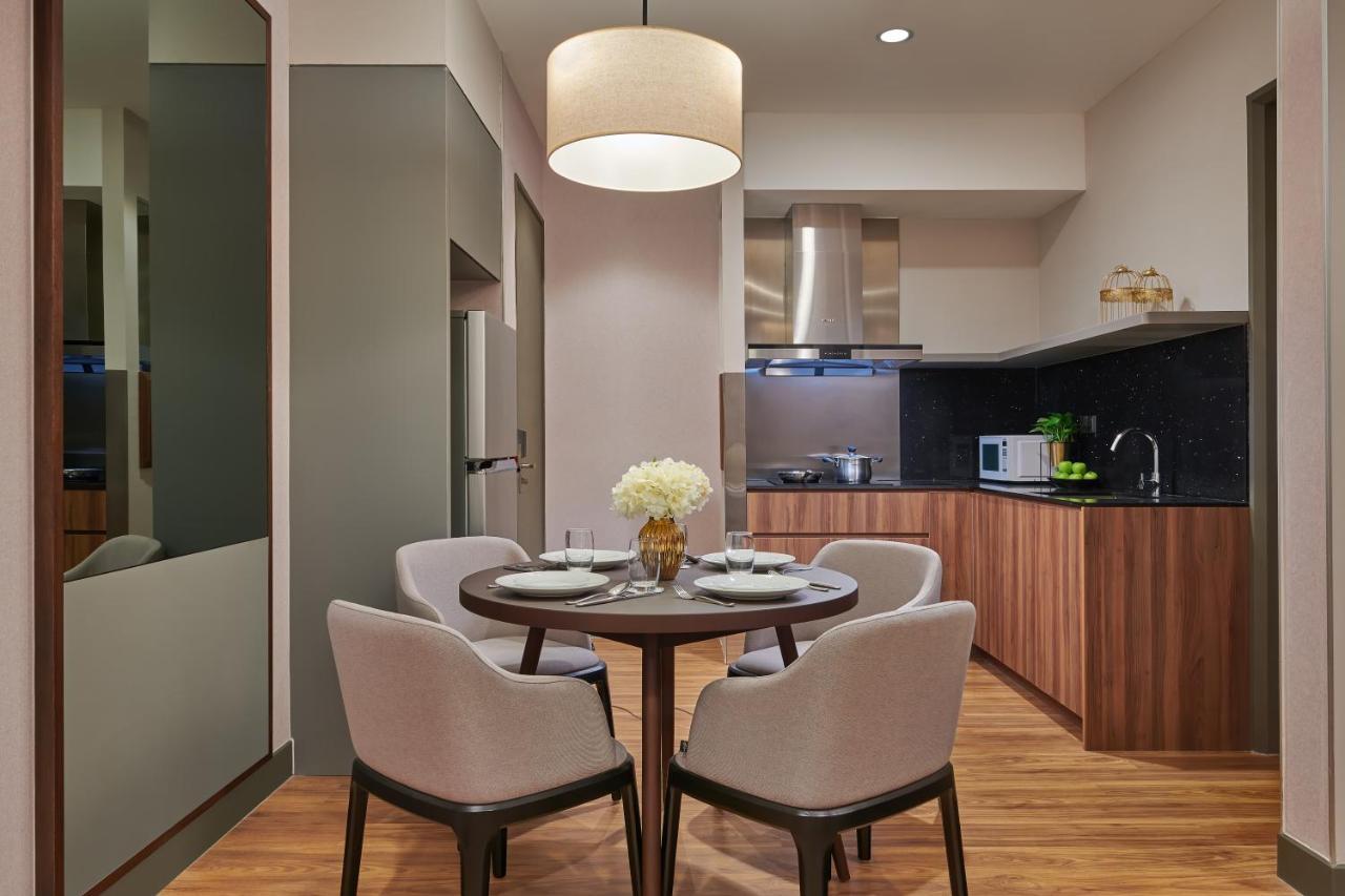 Mercure Living Путраджая Экстерьер фото A kitchen in a serviced apartment in Hong Kong