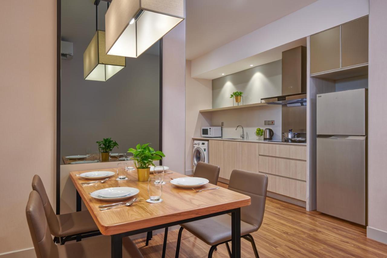 Mercure Living Путраджая Экстерьер фото A typical kitchen in a serviced apartment