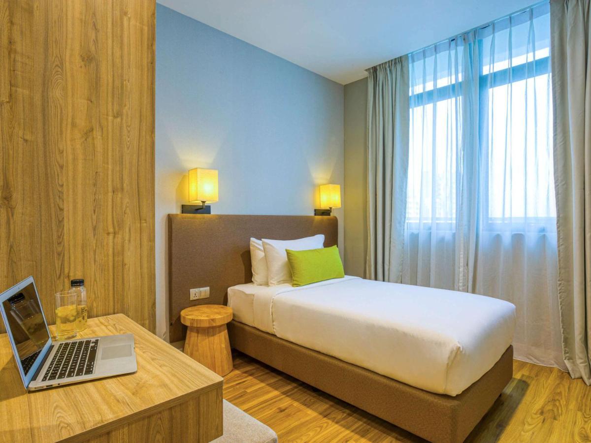 Mercure Living Путраджая Экстерьер фото A single room at the hotel